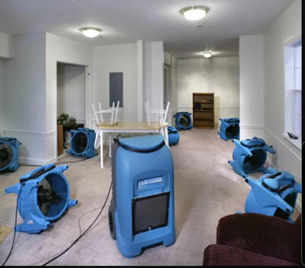 Air movers and dehumidifier setup for Water Damage Restoration in McGregor